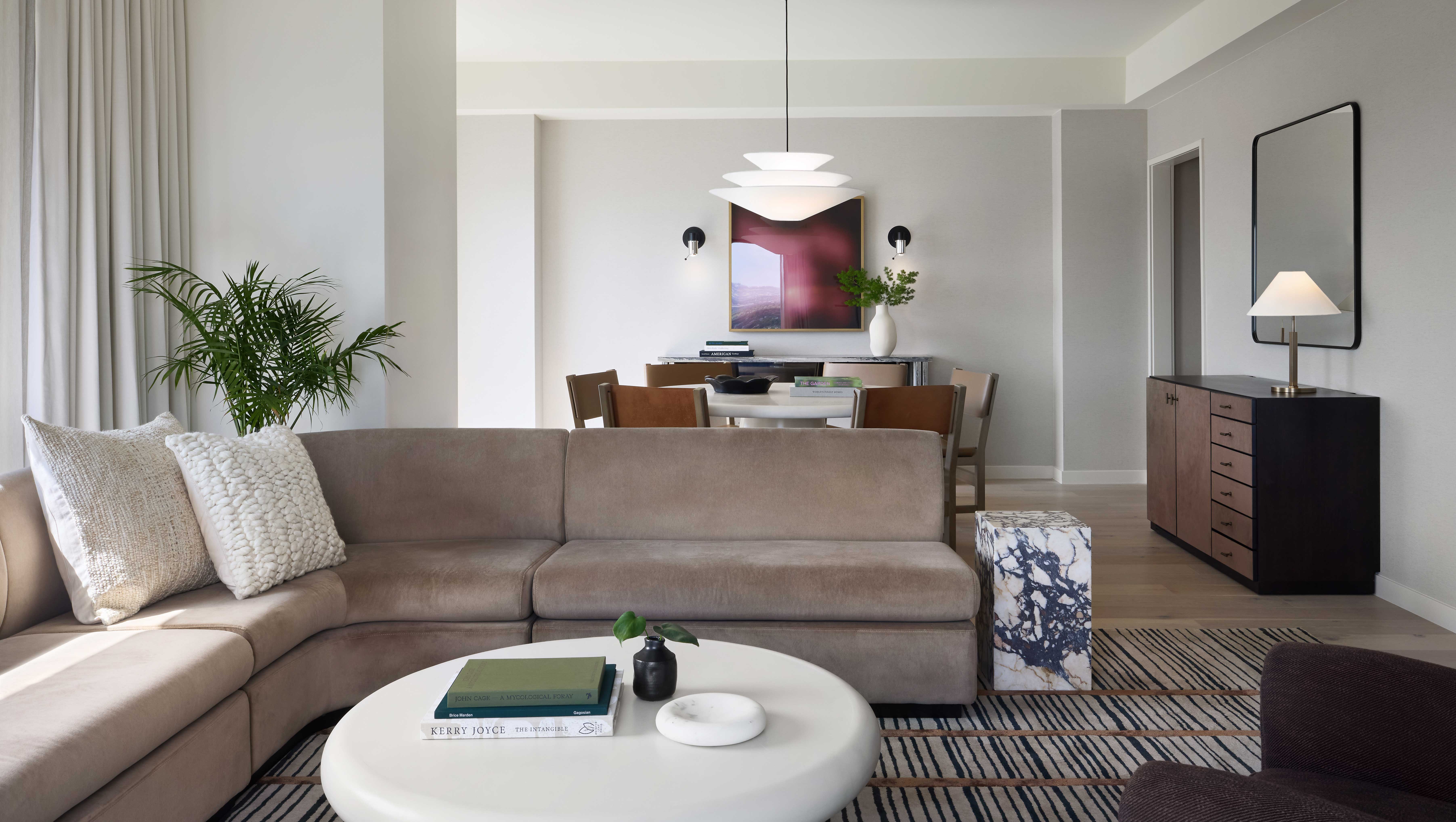 Suite seating and dining area at Kimpton Claret