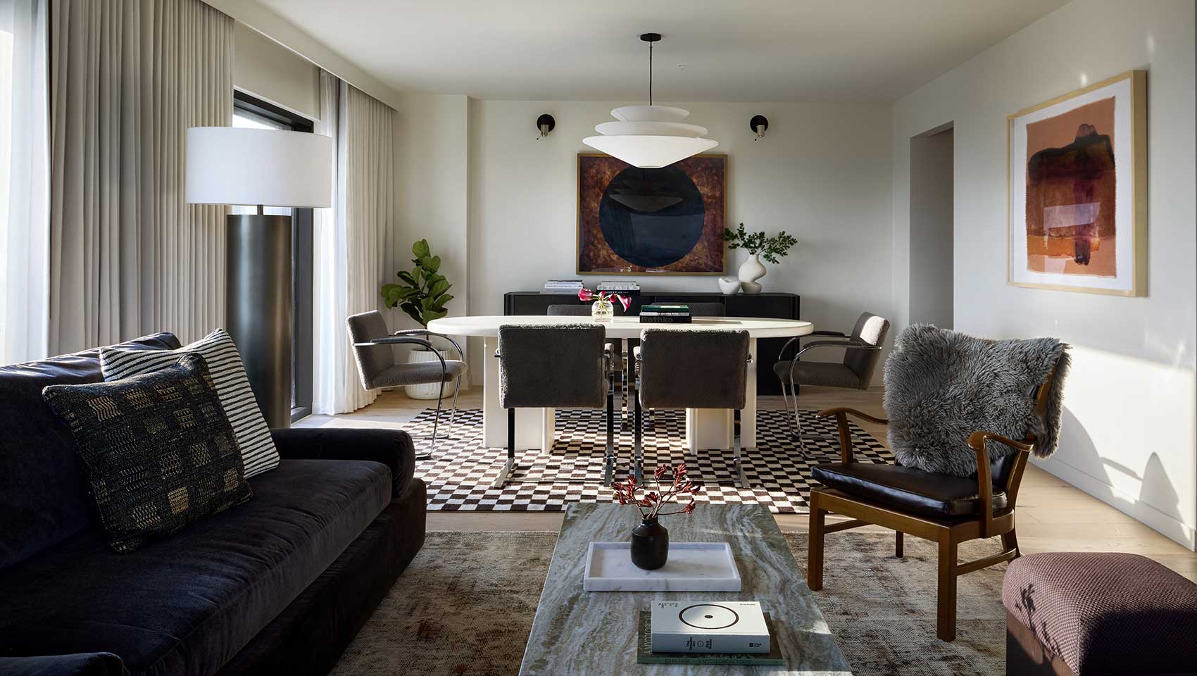 Aster Suite dining area and living area at Kimpton Claret Hotel