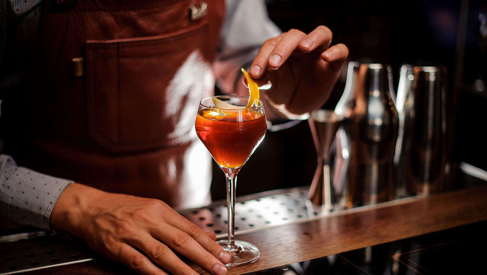 a cocktail being made at the bar