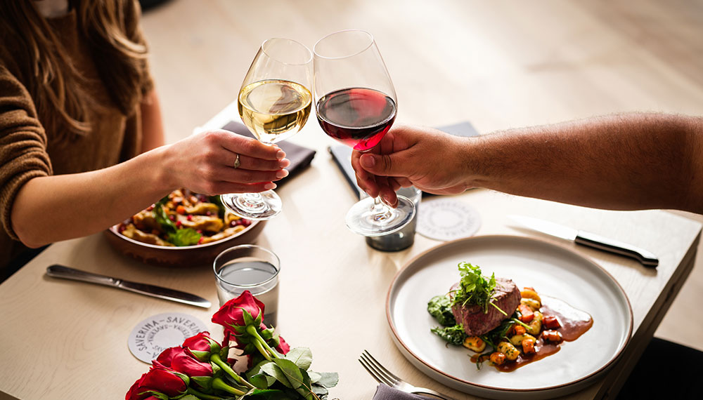 people cheersing wine