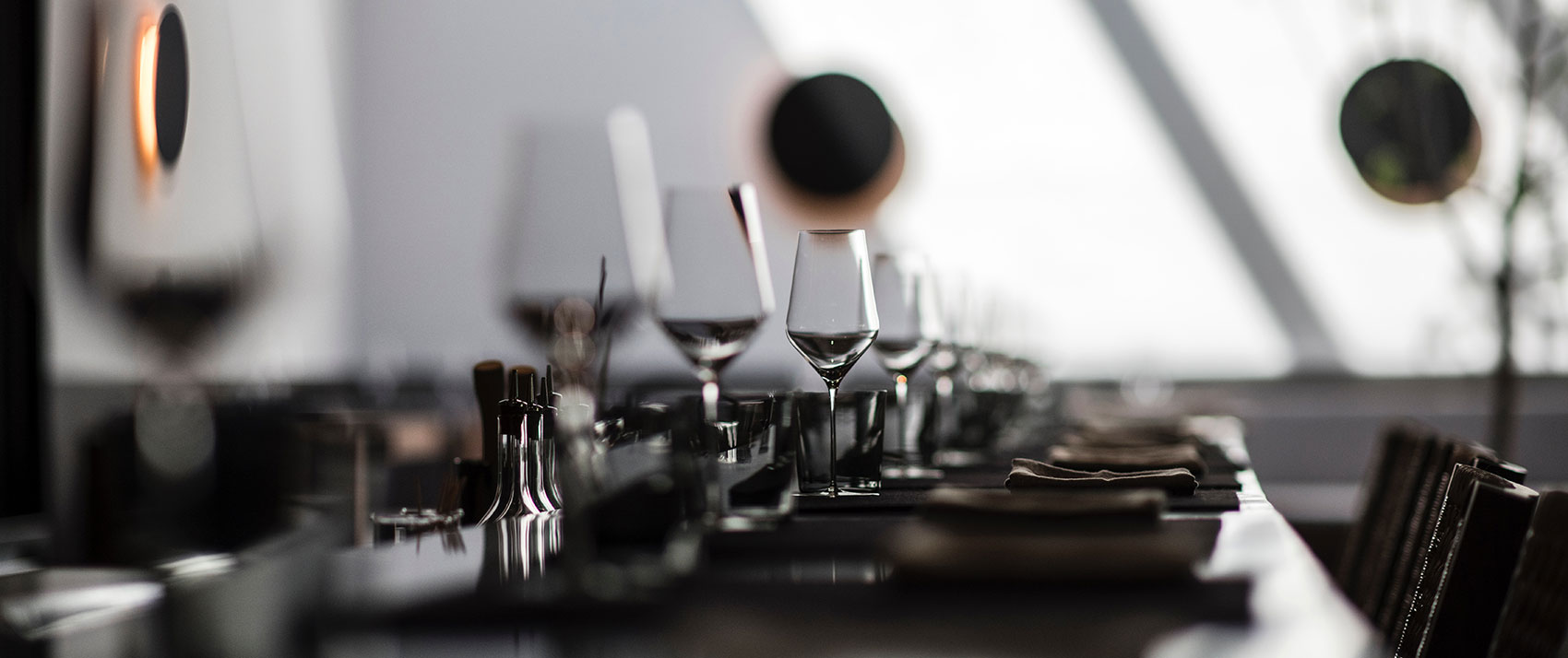 table of plates and wine glasses